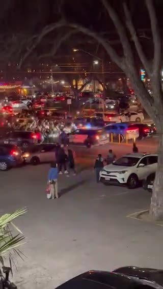 Chaos at Barton Springs and Lamar in #Austin. Rioters after a bunch of drifting push back police