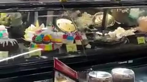 A mentally ill woman destroys the entire food section of the store while