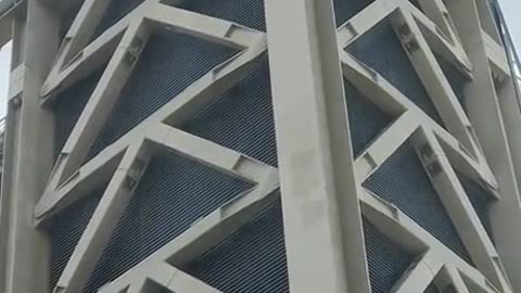 Man free climbing Leadenhall building in London