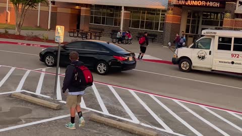 Mom with Microphone Gives Son Advice at School Drop Off