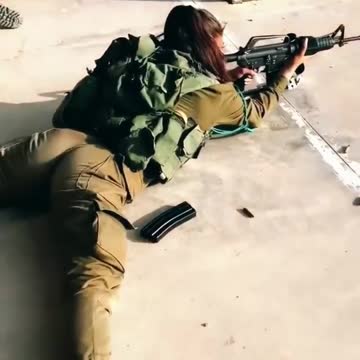 "Agility and Expertise: A Commando Lady Soldier's Skills with Firearms".