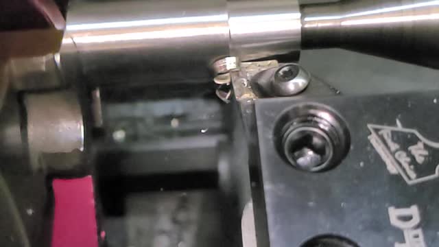 Turning 316 stainless steel bar on the lathe.