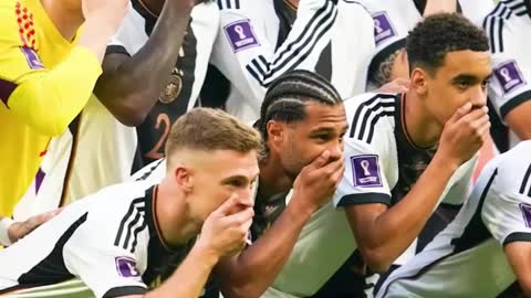 Why Did Germany Side Cover Their Mouths During Team Photo?