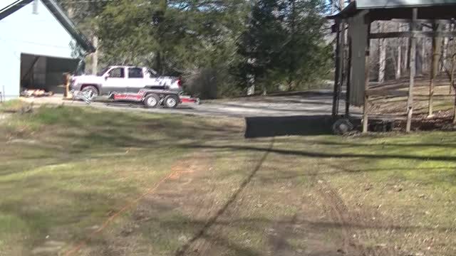 Heavy lathe being Loaded on a Car Hauler