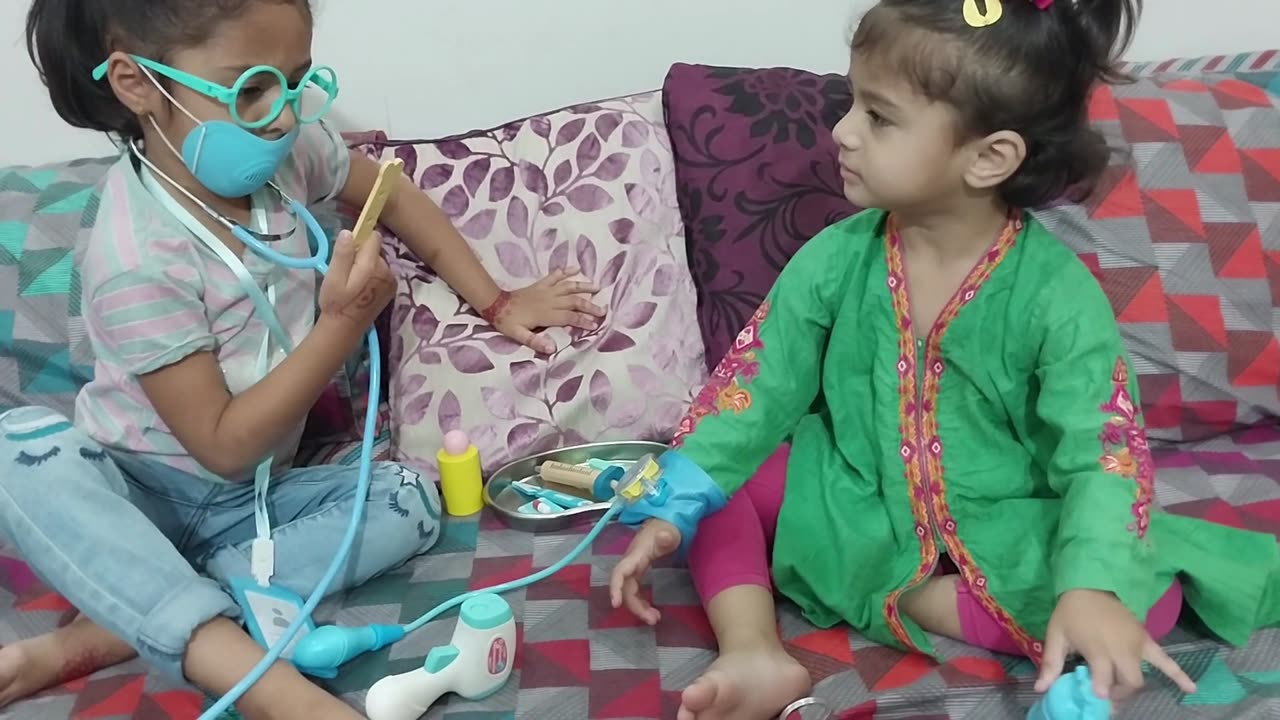 Fatima & Zainab playing with Doctor set