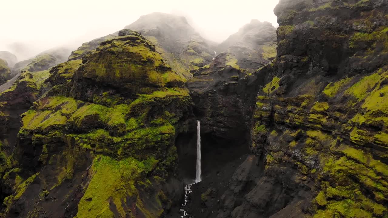 The waterfall by the end of the canyon