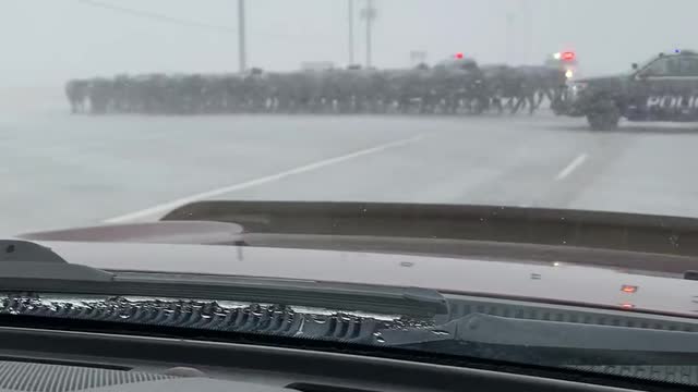 Police Provide Escort for Crossing Cattle