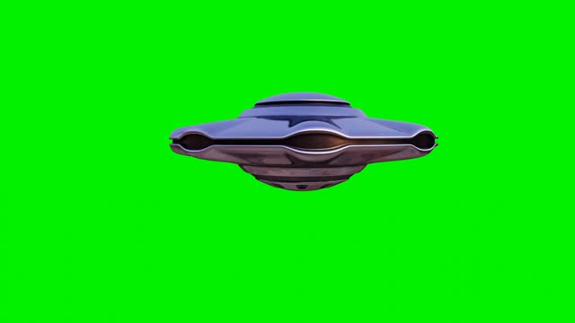 Flying saucer on green background