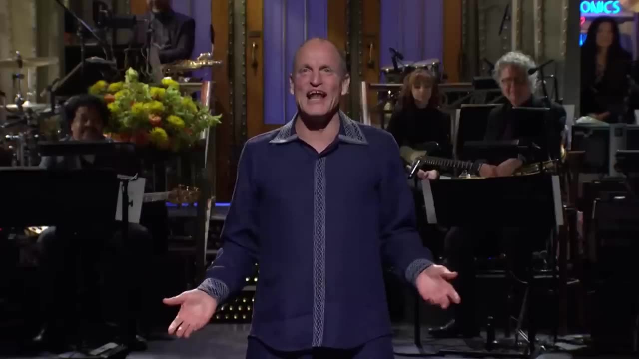 Woody Harrelson SNL jokes about Vax Conspiracy Movie Script