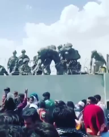 Afghan’s Handing Their Children to U.S. Soldiers