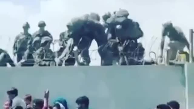 Afghan’s Handing Their Children to U.S. Soldiers