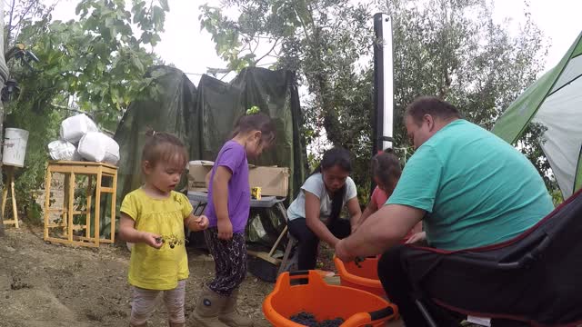 Filipino Eco-Farm Kids Crushing the Grapes