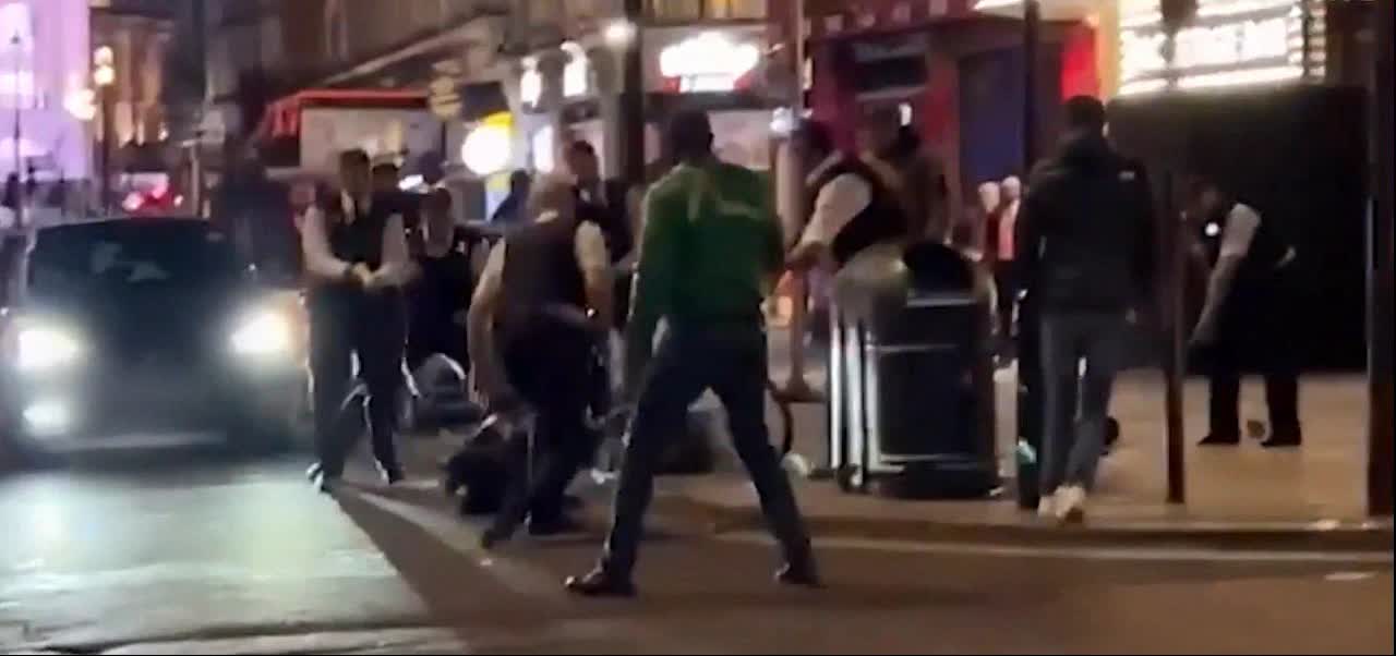 CLOWNISH BRITISH POLICE MEN IN ACTION