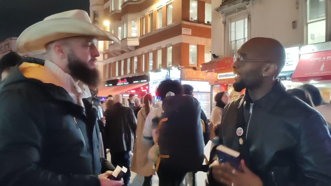 cowboy Muslim meets a Hindu at Leicester Square Speakers Corner