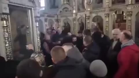 Nazis taking a priest