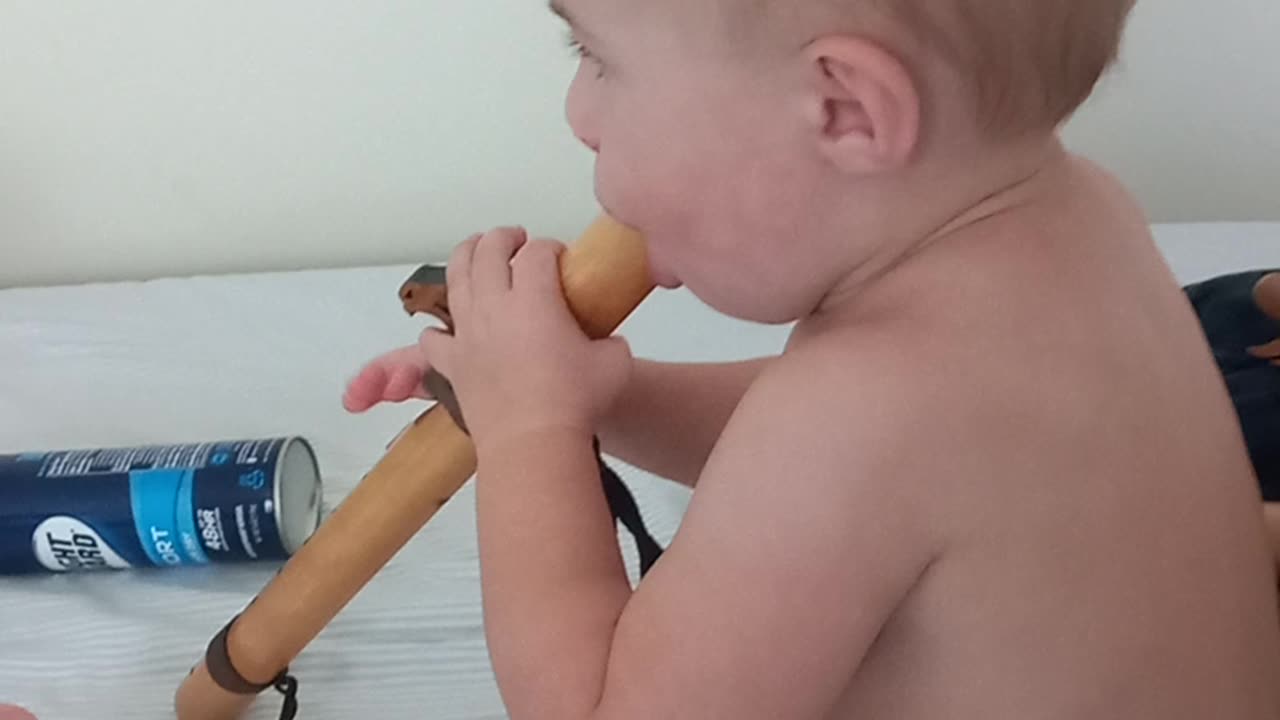 Delany playing flute