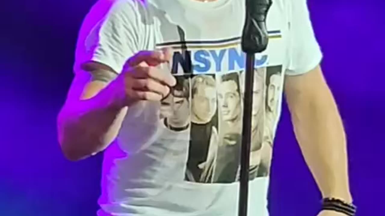 98 Degrees singing Back street boys in an “ *NSYNC Tee shirt