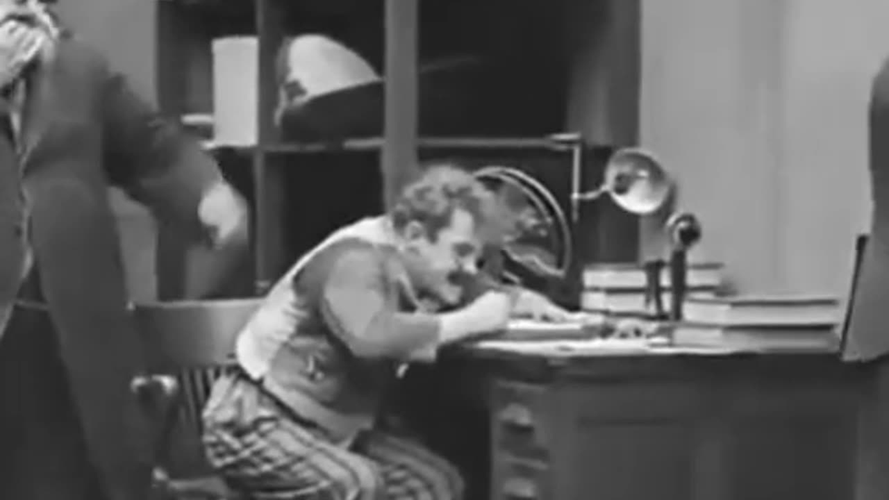 Charlie Chaplin's Hilarious Brawl: A Comedy of Fisticuffs!