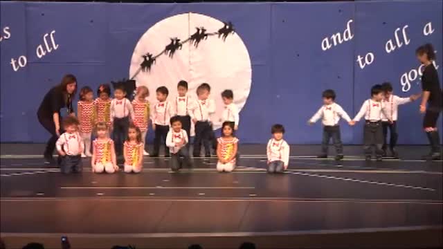 Aarushi preschool class rocking around christmas tree