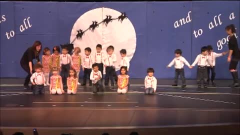 Aarushi preschool class rocking around christmas tree