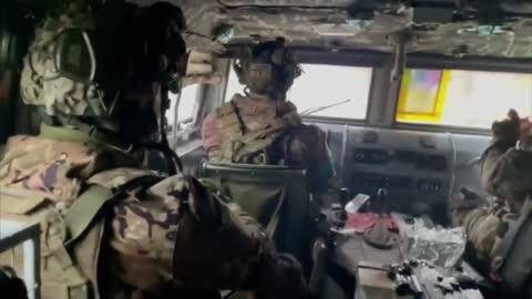 Mercenaries of the Georgian Legion on their way to Bakhmut in a reused Russian captured vehicle.