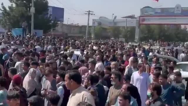 Thousands of people are trying to flee the Taliban arrive outside