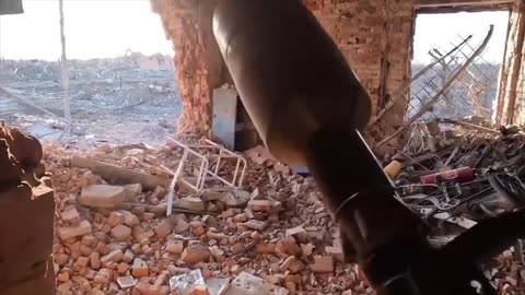 Ukrainians Fire an RPG from a Destroyed House in Maryinka