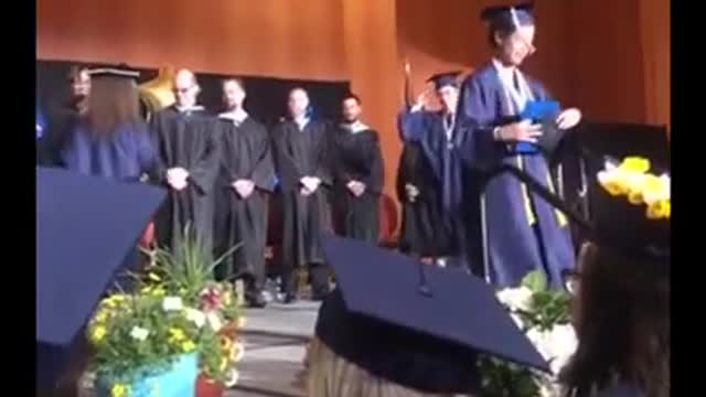 Guys Attempt To Perform Backflip At Graduation Ceremony But One Of Them Fails