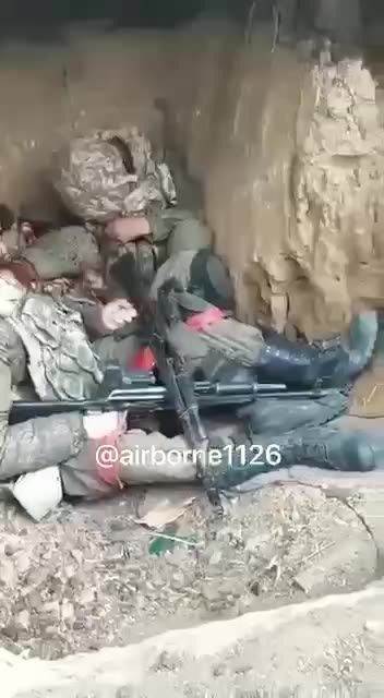 Ukrainians Clearing Russian Trenches