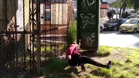 Guy Doing A Parkour Flip Off A Fence Hit The Ground Breaking His Leg