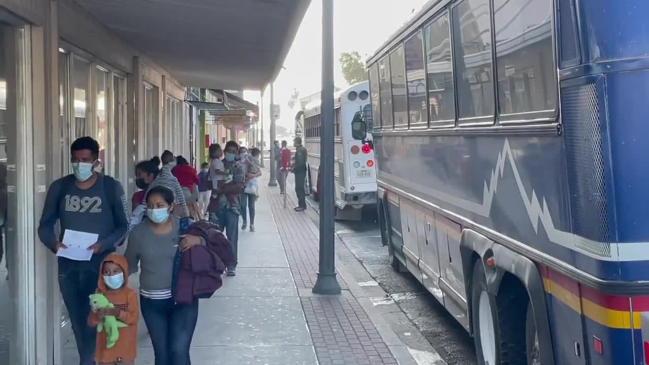 Border Patrol drop off multiple bus loads of migrants at a Catholic charity in downtown McAllen