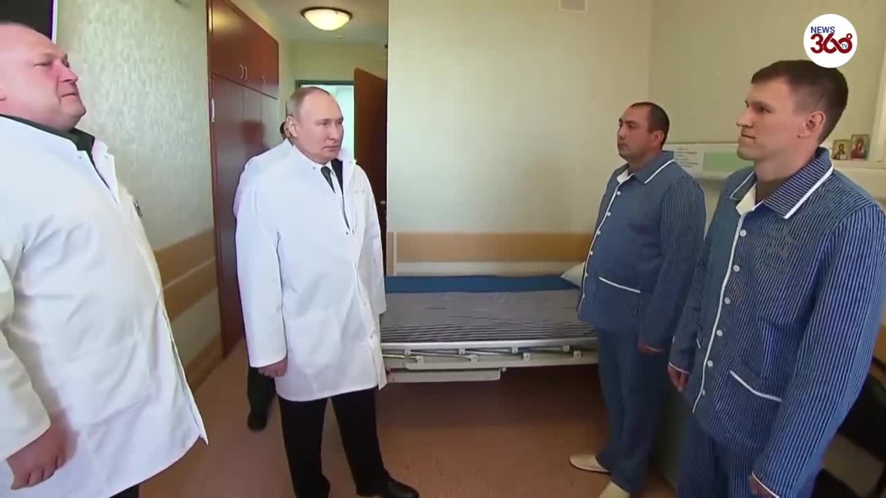 Putin visits wounded Russian soldiers in hospital for the first time