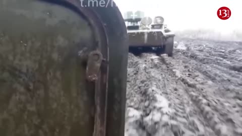 Ukrainian vehicles advancing on the difficult roads of the besieged Bakhmut