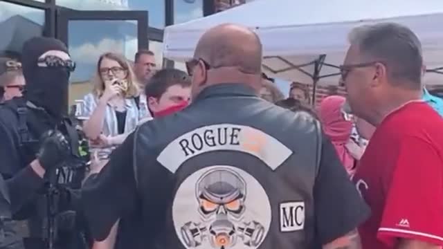 Antifa in Texas guard drag Queen childrens event with rifles