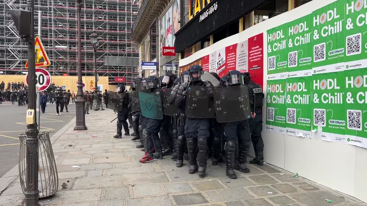 Here the French police is hit will all sorts of projectiles