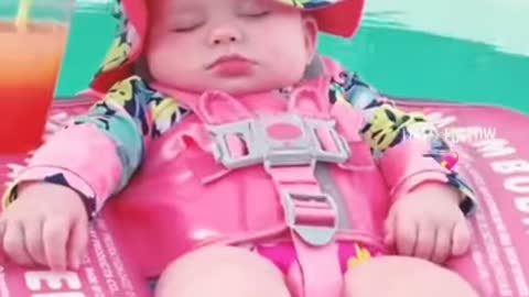 Baby tries to swim for the first time