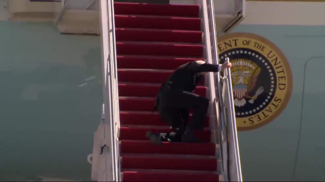 Biden falling down Airforce stairs. The most Funniest Iconic Clip Yet