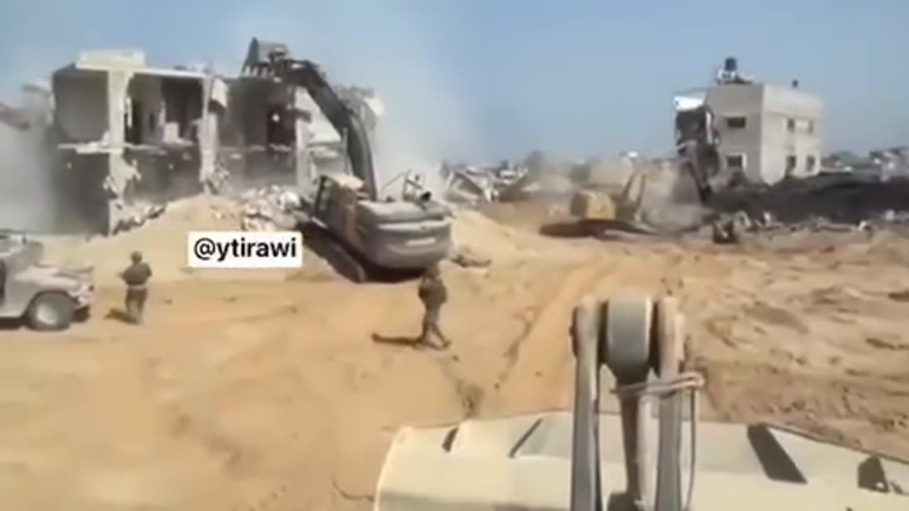 Israeli soldiers film a video bragging about their destruction of residential buildings