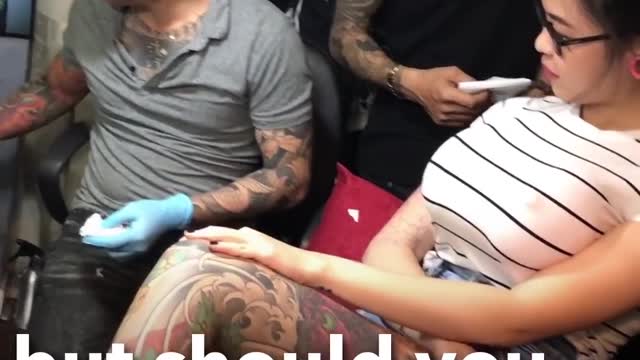 PRANK; Busty girl gets a Tattoo