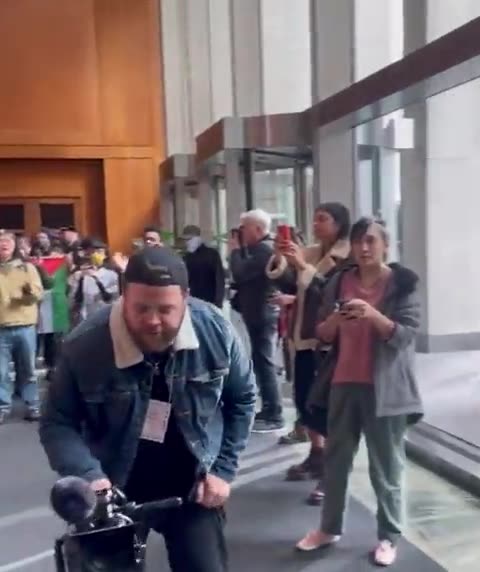 Pro-Palestinian protestors are occupying the lobby of Fox News in New York City.