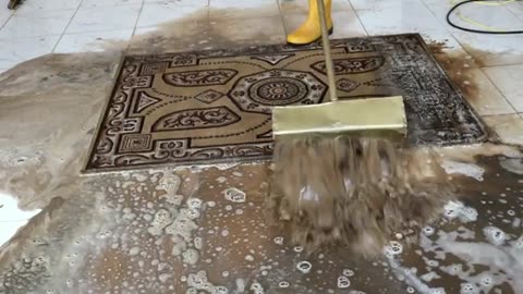 Washing the dirty carpet