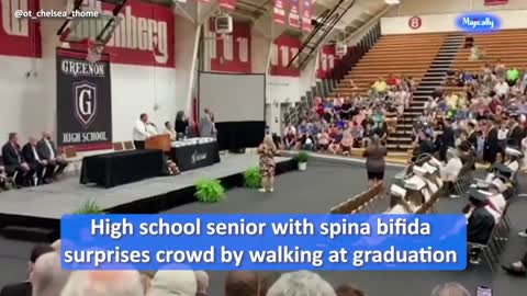 High school senior with spina bifida surprises crowd by walking at graduation