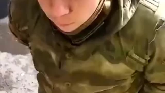Young captured Russian Soldier interrogated and questioned
