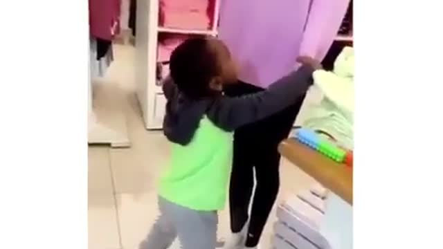 a little boy plays with a mannequin and almost fainted