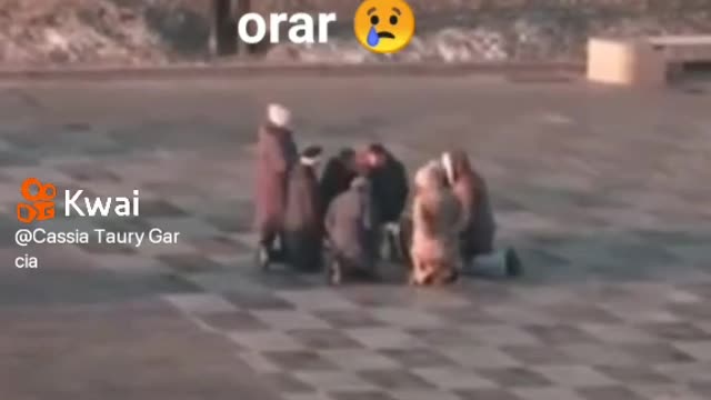 Russia attacks Ukraine and people kneel in the street to pray