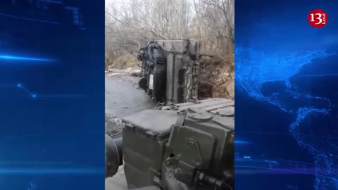 Russian tank crashes, overturning it blocks the road