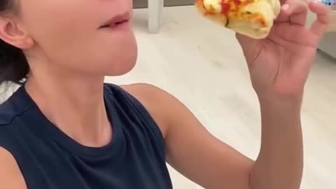 Kim Kardashian eating Piza today