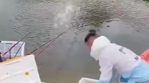 Why did he do that?! Feed'n the fish!!