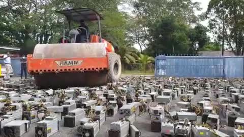 Watch: Malaysian Police Destroy Bitcoin Mining Rigs Worth Crores Using Steamroller