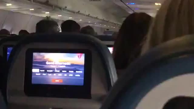 Mitt Romney, in a flight full of patriots in their way to DC